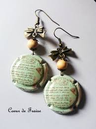 Boucles D Oreilles Capsule De Champagne Ecriture Leonard De Vinci Da Vinci Couleur Bronze Ruban Noeud Papillo Creation Bijoux Bijoux Bizarre Bijoux Originaux