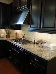 Tumbled Stone Tile With Darker Kona Espresso Like Finish Kitchen Inspirations Kona Kitchen Kitchen Remodel