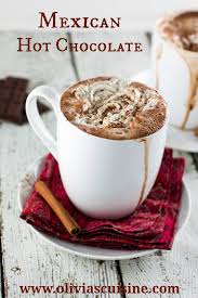 A hand grabs an abuelita tablet from the wrapper. Mexican Hot Chocolate Olivia S Cuisine