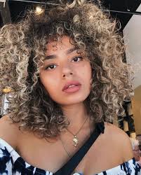 Nonetheless, cutting your hair in feathered layers from the middle point downwards can work for pretty much anyone. 20 Photos Of Type 3b Curly Hair Curly Hair Styles Curly Hair Styles Naturally Curly Hair Types