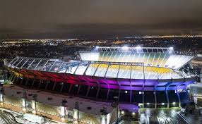 Below the logo is the team name in green italics. Commonwealth Stadium City Of Edmonton
