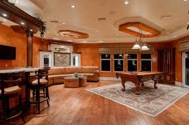This layout has a soda and whiskey cooler, a full bar, attractive lighting, and more. Man Cave Ideas For Your Basement That Are Elegant Builddirect