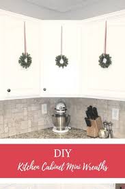Festive Holiday Kitchen Cabinet Wreaths Diy Project Diy Christmas Kitchen Holiday Kitchen Christmas Decor Diy
