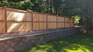 Shrubs for privacy fences grow quickly and are often planted too close together, however. Lacey Retaining Wall And Privacy Fence Ajb Landscaping Fence