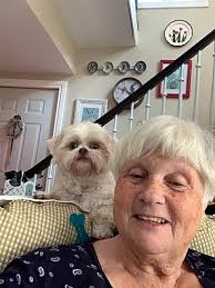 Adorable unlikely pair of animals lounging together