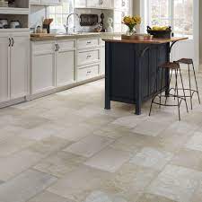 This element alone makes it ideal for use in kitchens, as well as bathrooms and even basements. Resilient Natural Stone Vinyl Floor Upscale Rectangular Large Scale Travertine Vinyl Flooring Kitchen Kitchen Vinyl Kitchen Flooring