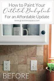 How To Paint A Tile Backsplash This Simple Tutorial Will Transform Your Outdated Tile In One Day Fo Painting Kitchen Tiles Tile Backsplash Diy Tile Backsplash