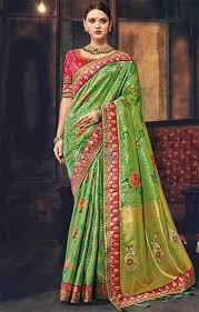 Shop This Artistic Forest Green Floral Banarasi Silk Saree For Mehendi This Modern Printed Saree B Party Wear Sarees Saree Designs Bridal Sarees Online