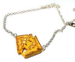 20 Cheesy Gifts To Help You Celebrate National Cheese Lovers Day Miniature Food Jewelry Food Jewelry Cheese Jewelry