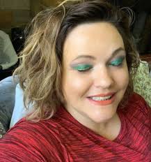 Leah's makeup look features shimmer eyes