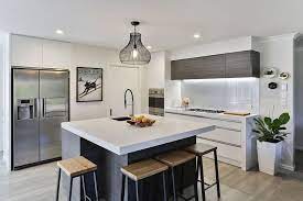 This Clean Lined Contemporary Kitchen For A Family Of Four Was Designed As Part Of A Major Re Square Kitchen Layout Kitchen Remodel Small Square Island Kitchen