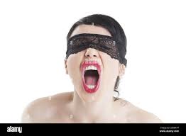 Screaming woman blindfolded Stock Photo - Alamy