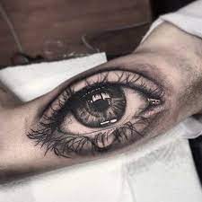 40 Outstanding Eye Tattoos Plus The Meaning And Rich History Behind Them Tattoo Insider Realistic Eye Tattoo Eye Tattoo Meaning Eye Tattoo
