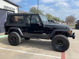 Image result for Brilliant Black 2005 Jeep