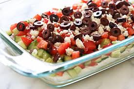 7 Layer Greek Dip Hummus Yogurt Red Onion Cucumbers Tomatoes Feta And Olives Are Layered To Create This Delicious Greek Recipes Greek Dip Appetizer Snacks