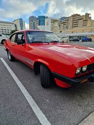 Image result for Bright Red 1980 Capri