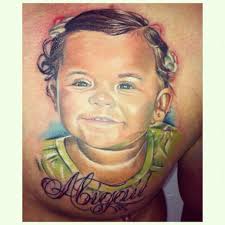 Tribal tattoo on baby face. 32 Baby Portrait Tattoo Images Pictures And Design Ideas