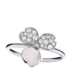Inspired by the idea of abstract flower petals, the tiffany paper flowers collection is a balance of refined femininity and industrial modernity. Tiffany Platinum Diamond Paper Flowers Ring 52 6 539872 Fashionphile