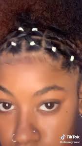 Your middle finger then comes down on top of the band to clamp it in place. 100 Rubber Band Hairstyles Ideas Natural Hair Styles Hair Styles Rubber Band Hairstyles