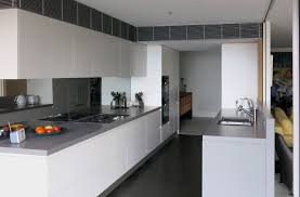 A Gelosa Kitchen Finished In White Satin Polyurethane Shadow Line Gris Expo Benchtop From Silestone Kitchen Renovation Kitchen Design Taupe Kitchen
