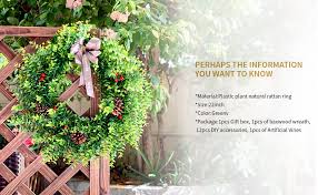 Wreath is 22 inches with a natural boxwood branch base. Amazon Com Kagdida Door Wreath Boxwood Wreath 22 Inch Boxwood Leaf Wreaths With Knotted Bow Green Garland For Indoor Wall Window Party Decor For Halloween And Thanksgiving Home Indoor Decor Fake Vines Home