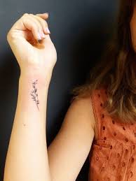 155 Cute And Small Flower Tattoo Designs To Feel The Fragrance Simple Wrist Tattoos Flower Wrist Tattoos Minimal Tattoo