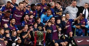 Players and coaches rode on top of an open bus showing off both trophies. Lionel Messi Strikes To Power Barcelona S Eighth La Liga Title In 11 Seasons