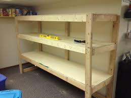 Lay a pair of 2 x 4 x 75 legs face down on your work surface. Building A Wooden Storage Shelf In The Basement Garage Storage Shelves Wooden Storage Shelves Cheap Storage Shelves