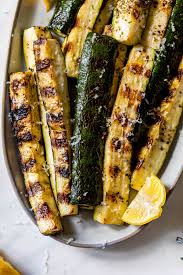 Use a pastry brush or a kitchen spoon to spread any remaining marinade on top of the chicken and vegetables. Dmnuruqaompnbm