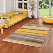 Teppiche sind neben einer gemütlichen couch oder einem behaglichen bett, ästhetischen möbeln und dekorativen bildern aus einem wohnlichen zimmer nicht. Designer Teppich Samba Beige Gelb Stripes
