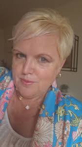 Bleached my hair and don't like it, tried purple shampoo to tone down  brassiness but how can I get a more natural looking blonde?? Do I put a  darker blonde