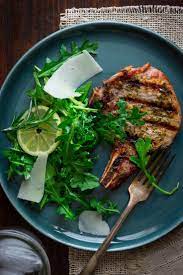 Simple Lemon Rosemary Pork Chops With Arugula Salad On Healthyseasonalrecipes Com Rosemary Pork Chops Pork Recipes Pork Dishes