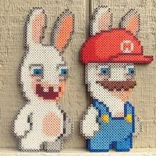 Rabbids I Ve Got A Few More To Make But For Now Please Enjoy A Perler Rabbid And Rabbidmario Perler Bead Mario Perler Bead Art Cross Stitch Games