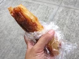 Filipino food contains salty, sour and sweet flavors. Turon Cues Manila The Philippines Local Food Guide