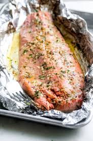 Bake on the center rack of the preheated oven for 25 to 30 minutes, or until salmon flakes easily and is cooked through. Garlic Butter Baked Salmon In Foil Recipe Little Spice Jar