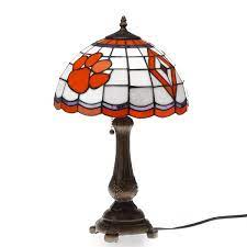 Maybe you would like to learn more about one of these? Clemson Tigers Tiffany Table Lamp