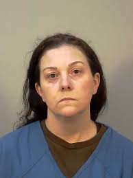 Woman held in alleged plot to poison boyfriend's exes