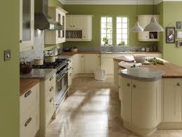 When you're ready to make a true statement in your kitchen, consider mixed door styles and finishes stately columns uphold beautiful style and partner with the timeless look of ivory cabinets with raised panel doors and detailed drawer fronts in our briarcliff ii. Broadoak Ivory Painted Kitchen Range Kitchen Ergonomics