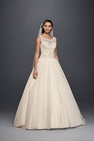 The bodice is beaded throughout and has spaghetti straps and the multiple layers of tulle in the skirt make for a perfect princess style gown. Oleg Cassini Classic Bridal Looks From David S Bridal