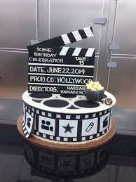 Whether you're gathering with a small group of friends to view a favorite movie, or hosting a big party to celebrate the academy awards, party city has the hollywood theme party tableware, hollywood party decorations, and even classic hollywood costumes to help you stage a theme party to remember. Popsugar Movie Theme Cake Movie Cakes Hollywood Cake