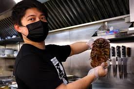 Taipei diners line up for noodles topped with deep sea isopods - The Japan  Times