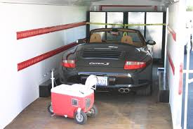 The trailer was connected and within the garage parking lot, i was in 3rd person view but the problem was the unload message wasn't popping up, just the message informing me there's insufficient point to unlock was. Complete Moblile Garage Systems