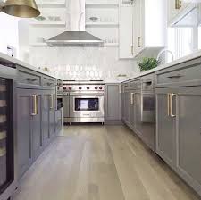 Gray Cabinets Top And Bottom Gold Hardware White Backsplash Grey Kitchen Floor Kitchen Design
