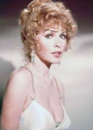 CAROL LYNLEY AS THE SHIP'S SINGER NONNIE PARRY WITH THE FREELOADERS “It's a  free trip for free music. They're going to jazz festival in Sicily.”