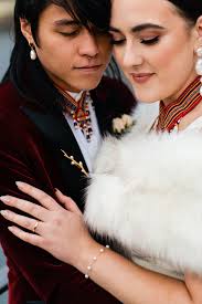 Nonbinary Philadelphia wedding with a stunning red velvet suit • Offbeat  Wed (was Offbeat Bride)