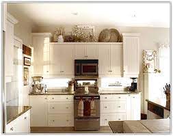 Decorate Top Kitchen Cabinets Home Design Ideas In 2019 Kitchen Cabinets Decor Cabinet Decor Above Kitchen Cabinets