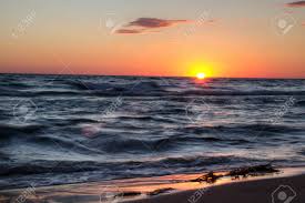 Sunset beach theme on your home screen or lock screen. Sunset Beach Background Sunset Sky And Waves Crashing On The Stock Photo Picture And Royalty Free Image Image 79915852