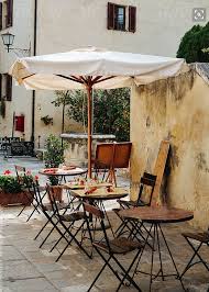 An Ode To Tuscany The Enchanted Home Outdoor Cafe Italian Patio European Cafe