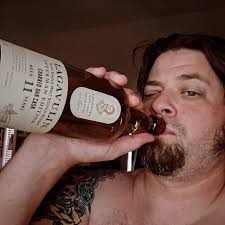 Paul Newman in a 'get really stoned' tee with four beers in 1981. Dude.