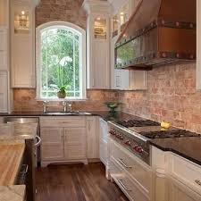 White And Black Kitchen With White Exposed Brick Backsplash Transitional Kitchen Exposed Brick Kitchen Brick Kitchen Kitchen Remodel